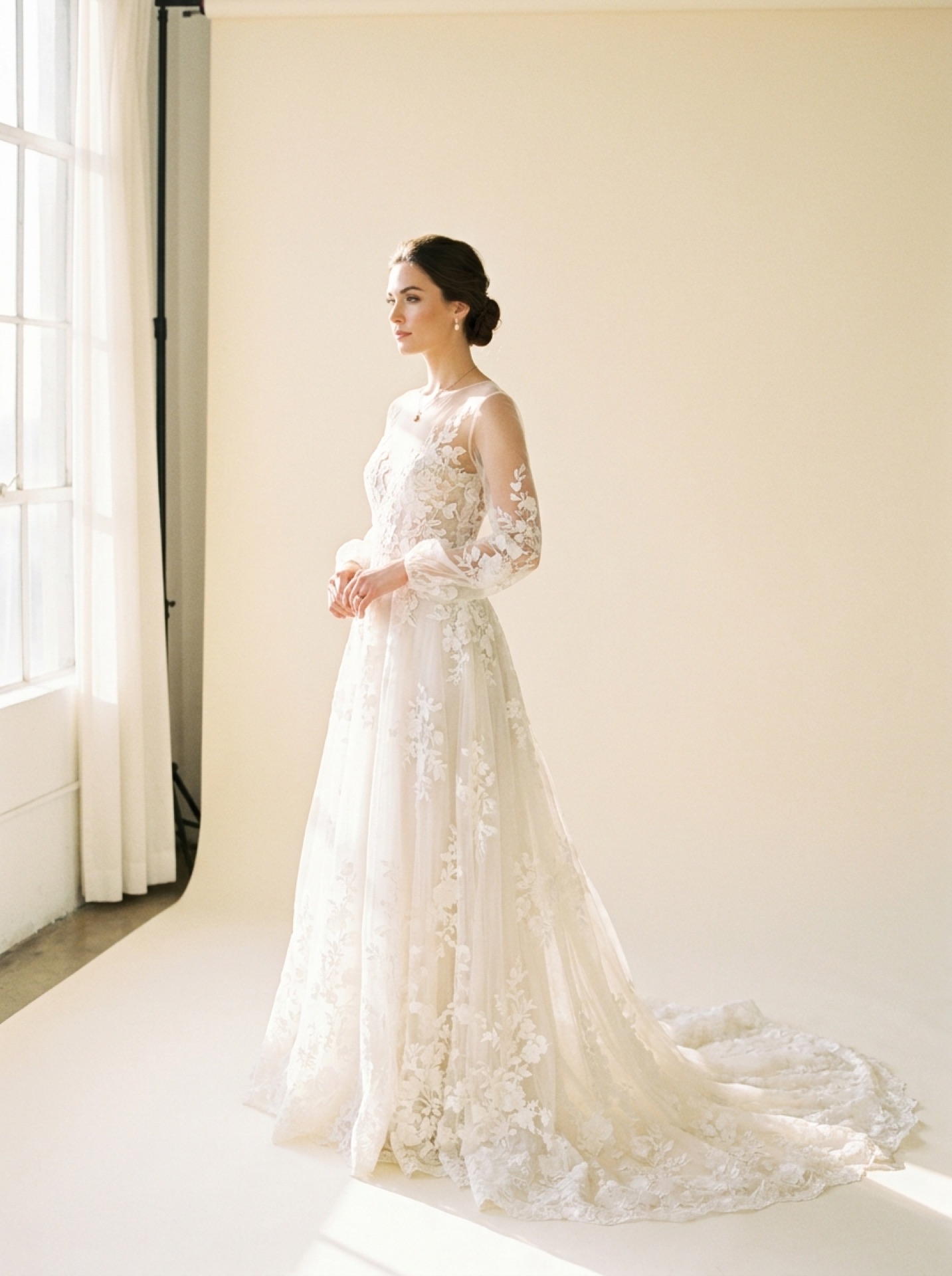 Hayley Paige blush ballgown with floral appliqué and pockets